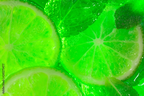 mint and lime in cocktail close-up