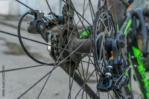 Closeup of a mechanism of bicycle mechanisms and chain on a mountain bike. Pedals from a mountain bike. Close the detailed view.