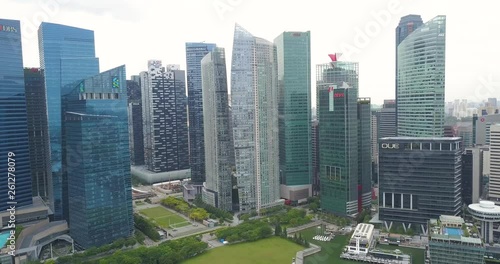 Aerial shot of tall skyscrapers in Singapore bay