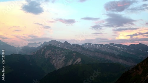 Time Lapse: Stunning Mountains Under Cloudy Sky in Megeve, France photo