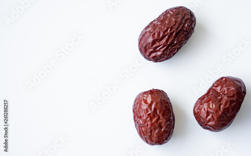 Red dried Jujubes isolated in white background, health food