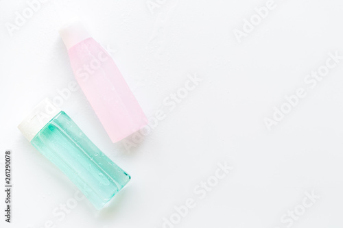 skin care cosmetics with facial tonic, mycelial water on white background top view mockup