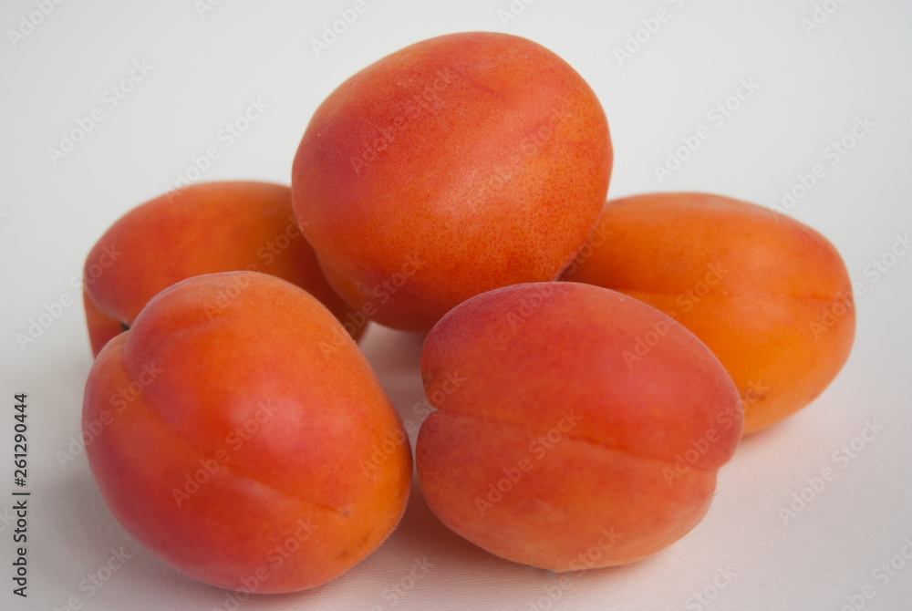 Close up of five ripe and whole orange apricots Close up of five ripe and whole orange apricots