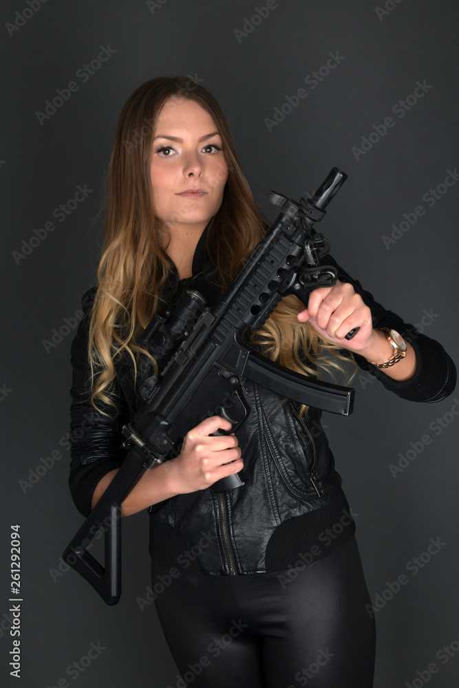 Woman holding gun 