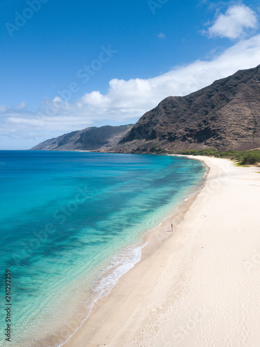 Tropical paradise beach with white sand and mountain background travel tourism wide panorama background. Hawaiian beach. Oahu.