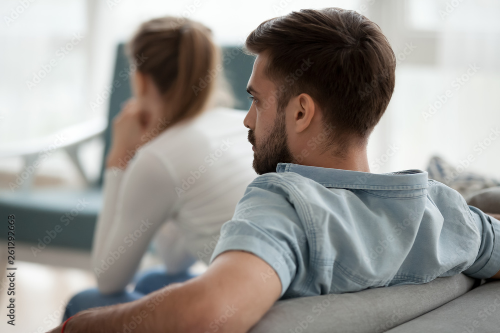 Unhappy couple ignoring each other after quarrel, relationships problem Unhappy couple ignoring each other after quarrel, relationships problem