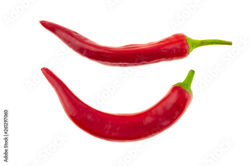 curved pod of peppers parallel vegetable on a white basis culinary design menu contrast background