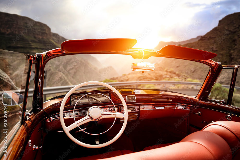 Summer car on road and sunset time in mountains.  - obrazy, fototapety, plakaty 