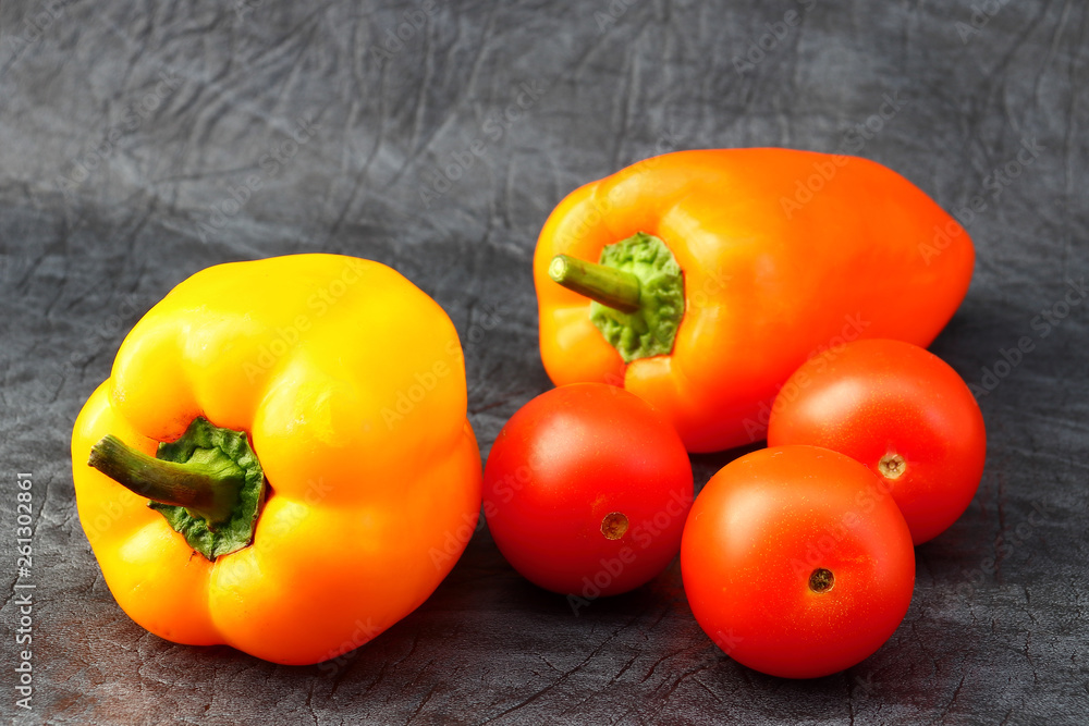 Bright vegetables and fruits (yellow and orange peppers, red tomatoes, yellow lemon, green dill). Bright vegetables and fruits (yellow and orange peppers, red tomatoes, yellow lemon, green dill).