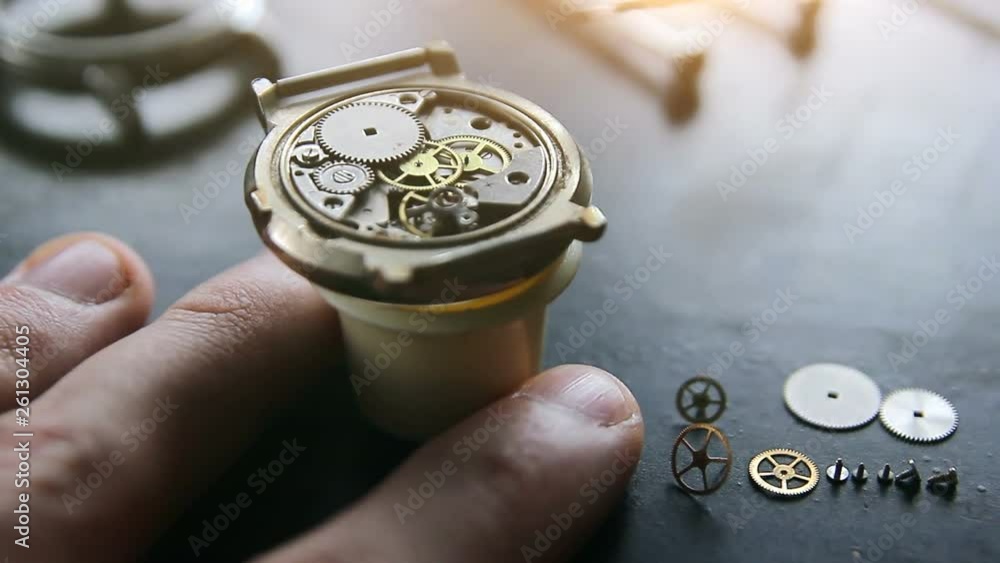 Watchmaker is repairing the wristwatch, mechanical watch Watchmaker is repairing the wristwatch, mechanical watch