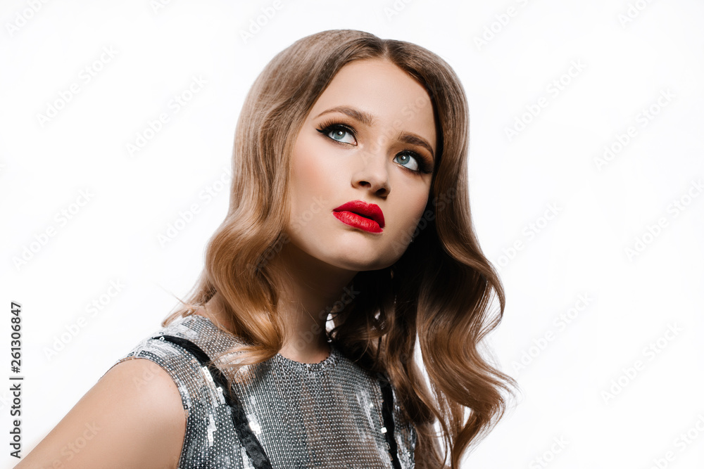 Portrait of a fashion and beauty brunette woman with perfect makeup and windy hair Portrait of a fashion and beauty brunette woman with perfect makeup and windy hair