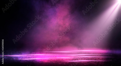 Ultraviolet background of empty foggy street with wet asphalt, illuminated by a searchlight, laser beams, smoke