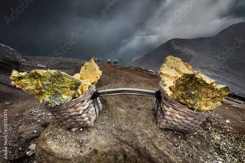 Baskets of mined Sulphur, Mount ljen, Banyuwangi, East Java, Indonesia photo