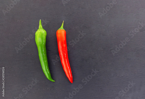 two mature peppers sharp sharp pod contrast background black copy space design base