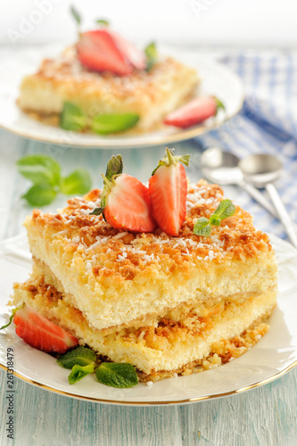 Bright sunny rustic pie with cottage cheese cooked. Fresh with strawberries and mint. Vertical view.