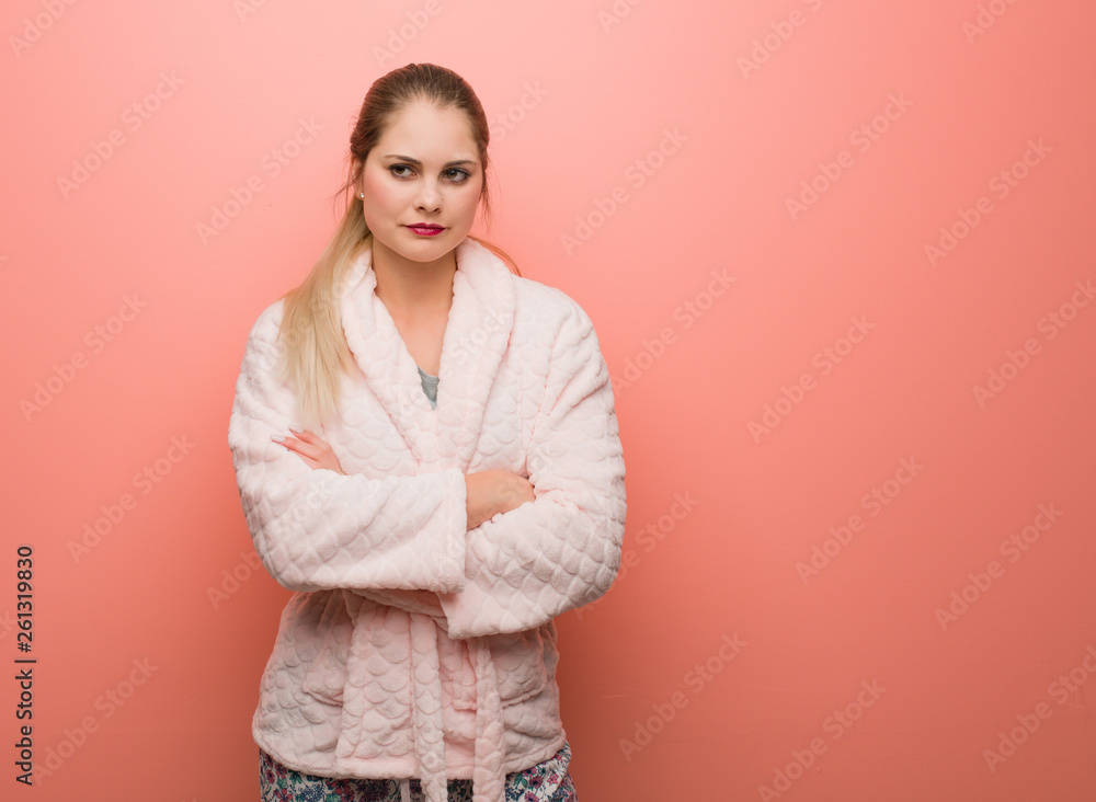 Young russian woman wearing pajama crossing arms relaxed Young russian woman wearing pajama crossing arms relaxed