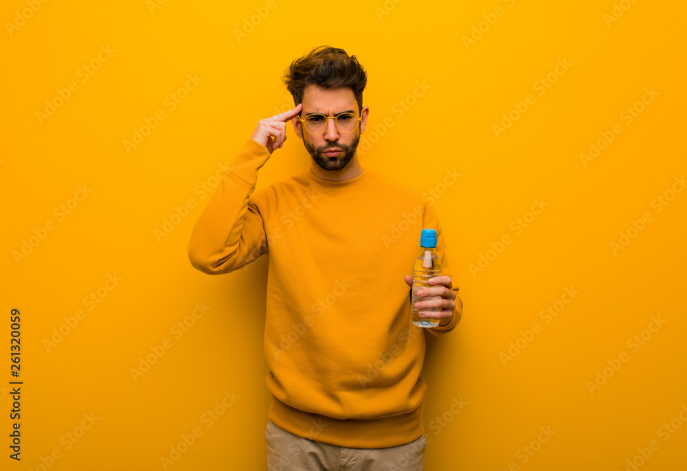 Young man doing a concentration gesture Young man doing a concentration gesture