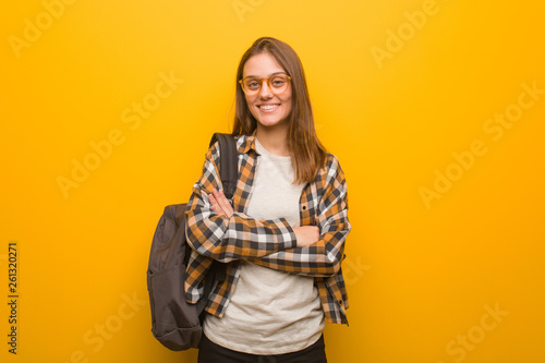 Young student woman crossing arms, smiling and relaxed © Asier