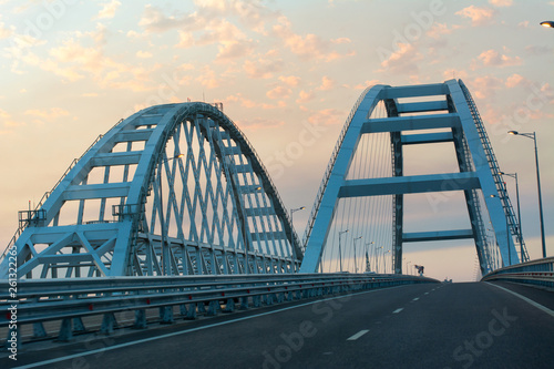 Crimean bridge over the black and Azov seas to the city of Kerch at sunset in summer