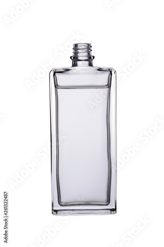 the squared perfumery glass bottle with transparent liquid isolated on a white background