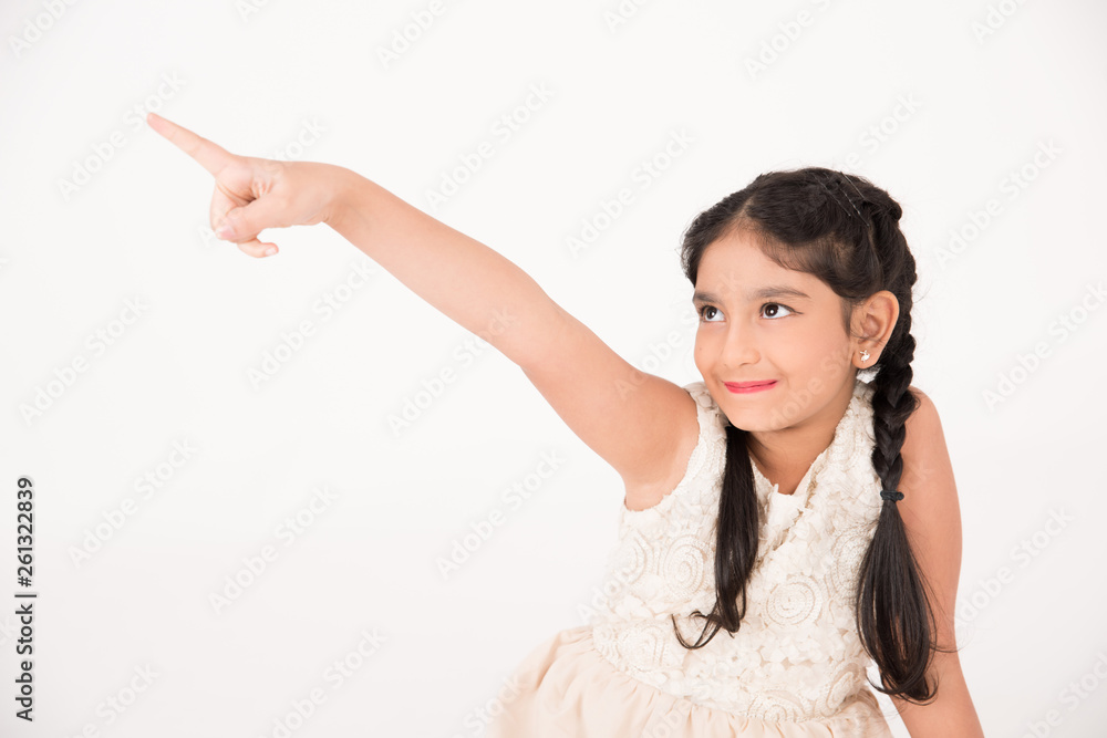 Female child sitting on the floor and indexing Female child sitting on the floor and indexing