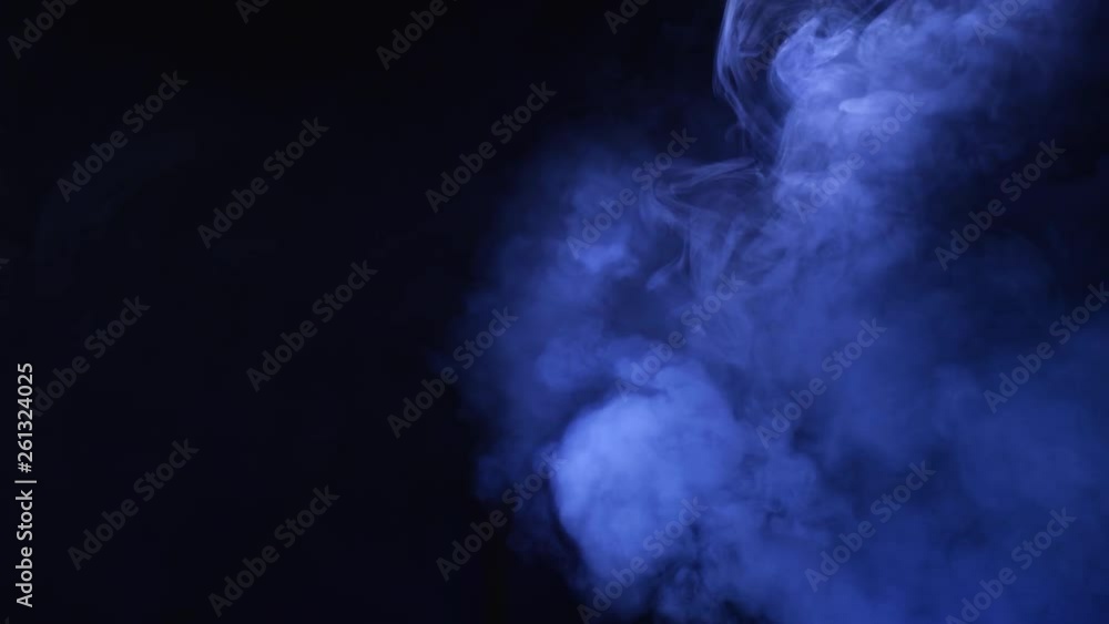 Smoke in slow motion on black background. Сolor smoke slowly floating through space against black background. Smoke in slow motion on black background. Сolor smoke slowly floating through space against black background.