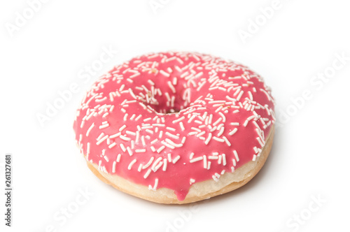 Closeup of pink doughnut on white background