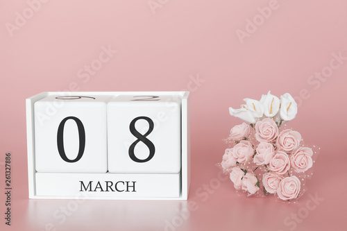 March 08th. Day 8 of month. Calendar cube on modern pink background, concept of bussines and an importent event. photo