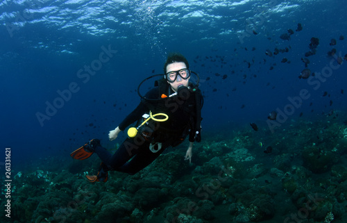 Sexy girl under water. Diving and snorkeling. Tulamben, Bali, Indonesia.