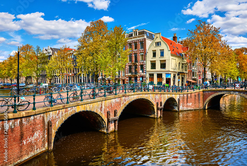 Photography Bridge over channel in Amsterdam Netherlands houses river Amstel landmark old european city spring landscape