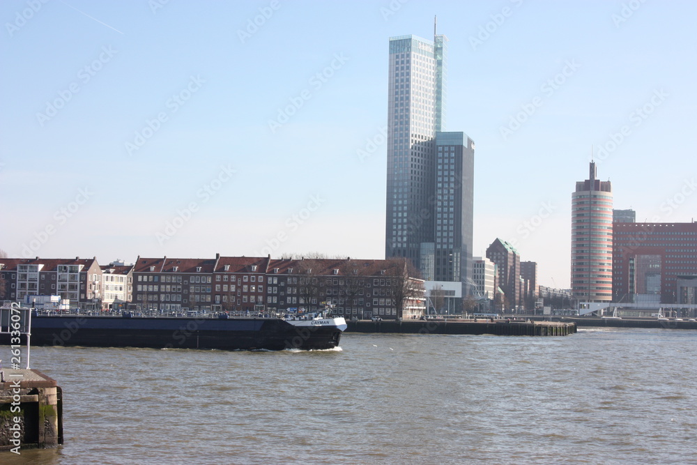 Obraz premium a journey to discover the modern and futuristic architectural city of Rotterdam, between bridges and skyscrapers