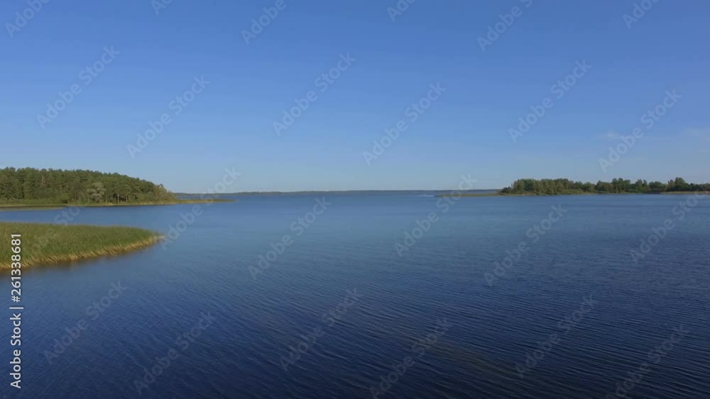 Aerial View Of Water Surface, Reeds And Forest Of Beautiful Lake Seliger, Russia Aerial View Of Water Surface, Reeds And Forest Of Beautiful Lake Seliger, Russia