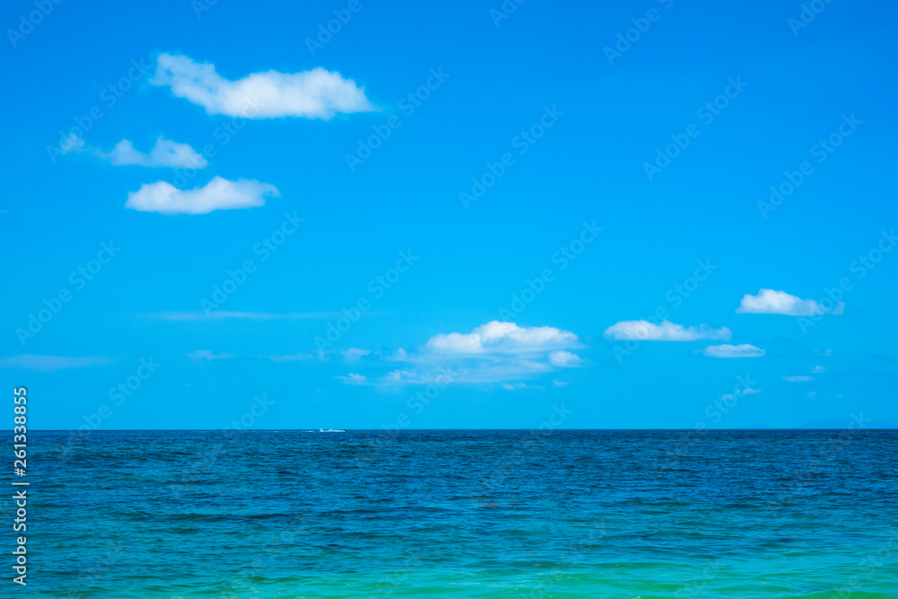 Calm flat surface of sea and cloudless clear blue sky at horizon. Calm flat surface of sea and cloudless clear blue sky at horizon.