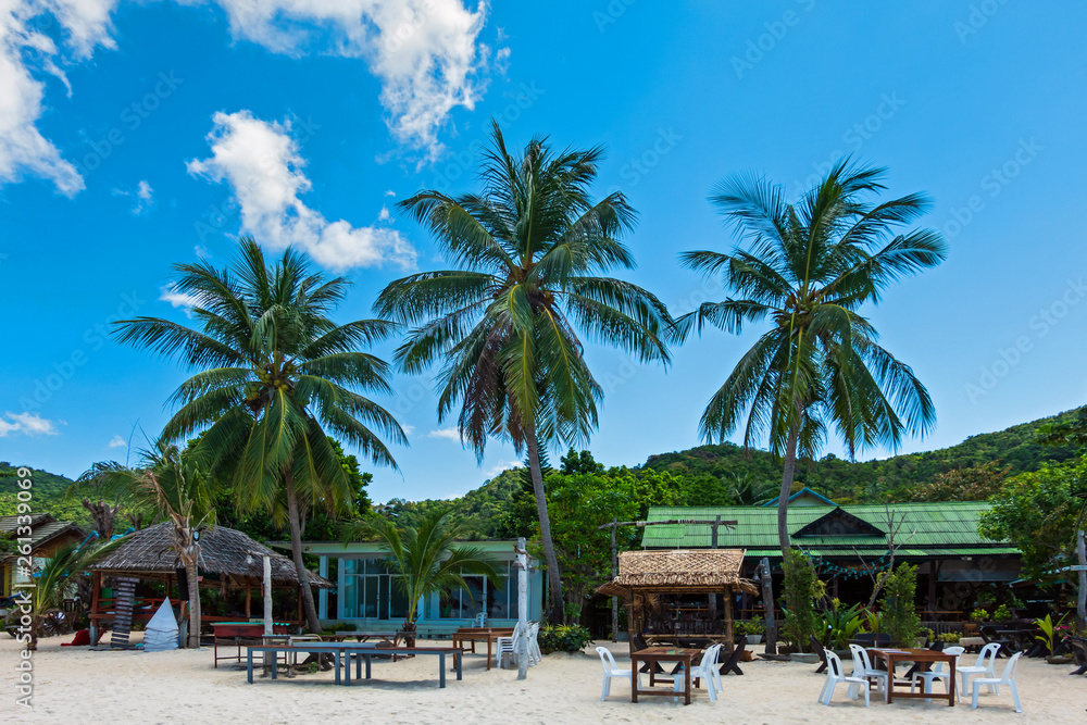 Group of table and chair setting in restaurant bar on the white sandy beach at Thailand