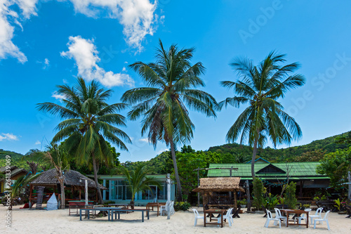 Group of table and chair setting in restaurant bar on the white sandy beach at Thailand