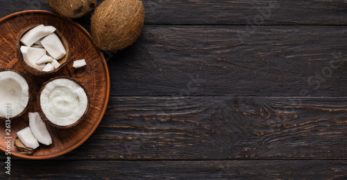 Coconuts on wooden plate