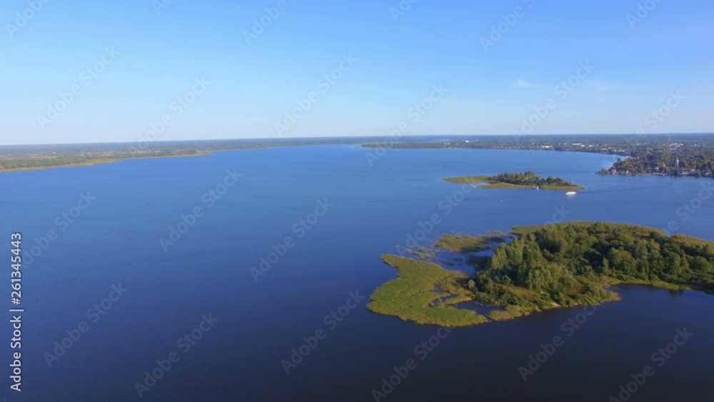Aerial View Of Water Surface, Islands And Motor Ship On Lake Seliger, Russia Aerial View Of Water Surface, Islands And Motor Ship On Lake Seliger, Russia
