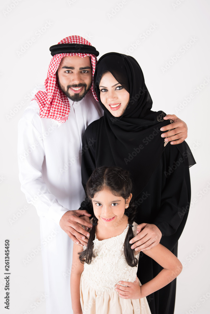 Arab family standing on white background