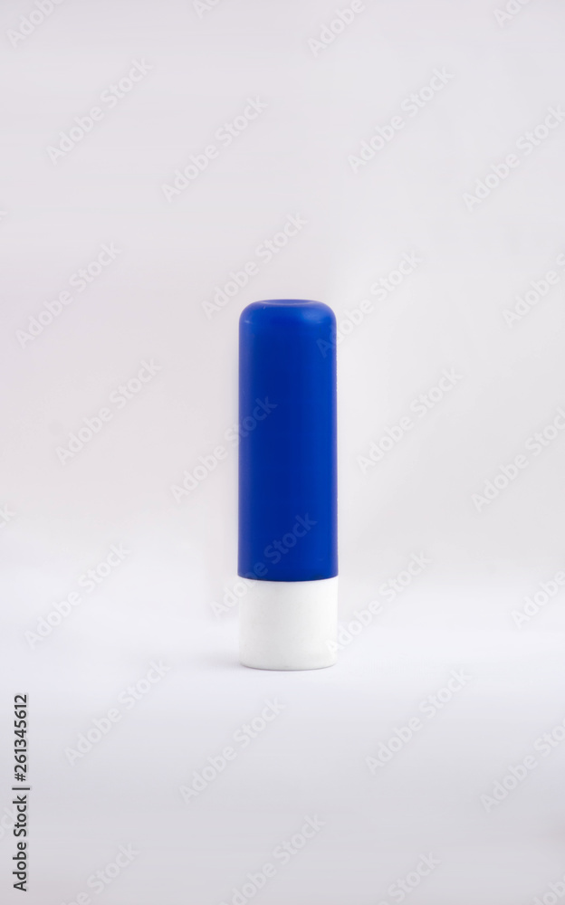 chap stick lip balm, blue tube isolated on white background chap stick lip balm, blue tube isolated on white background