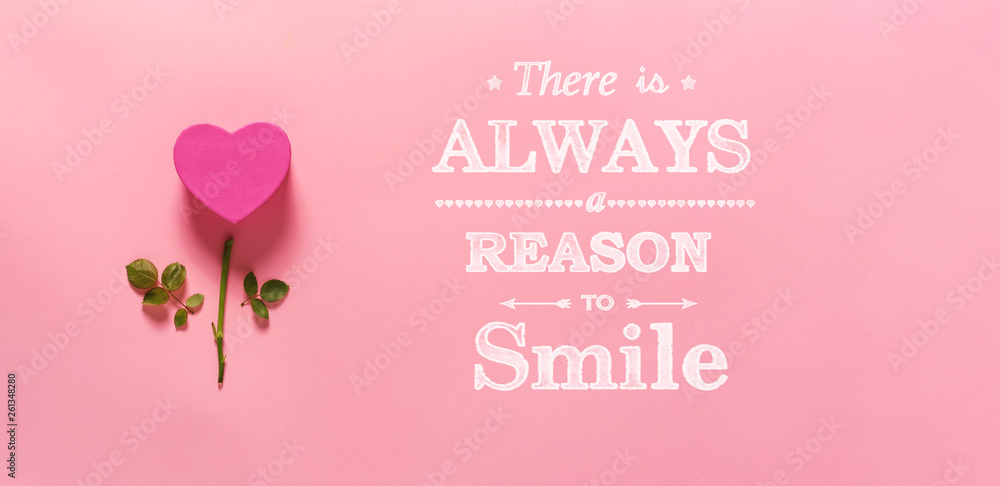 There is always a reason to smile with heart flower top view flat lay There is always a reason to smile with heart flower top view flat lay