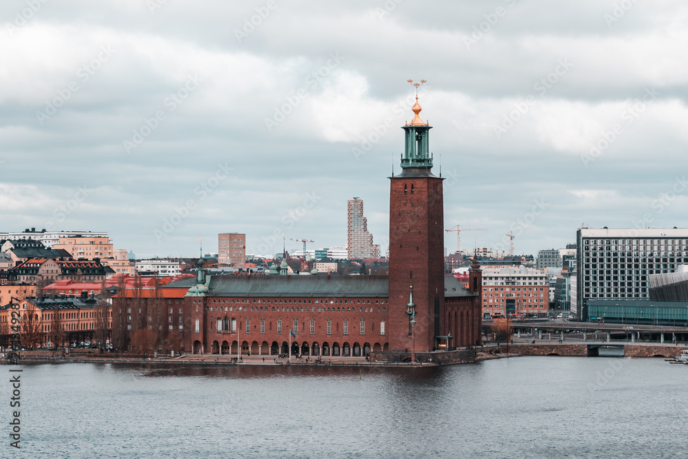Fototapeta premium The Stockholm City Hall by the river Riddarfjarden, a classical picture, Sweden