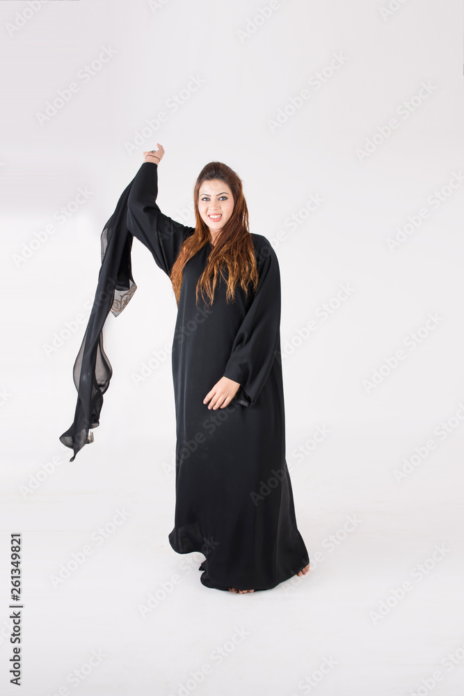Beautiful Arab woman in traditional dress dancing Beautiful Arab woman in traditional dress dancing