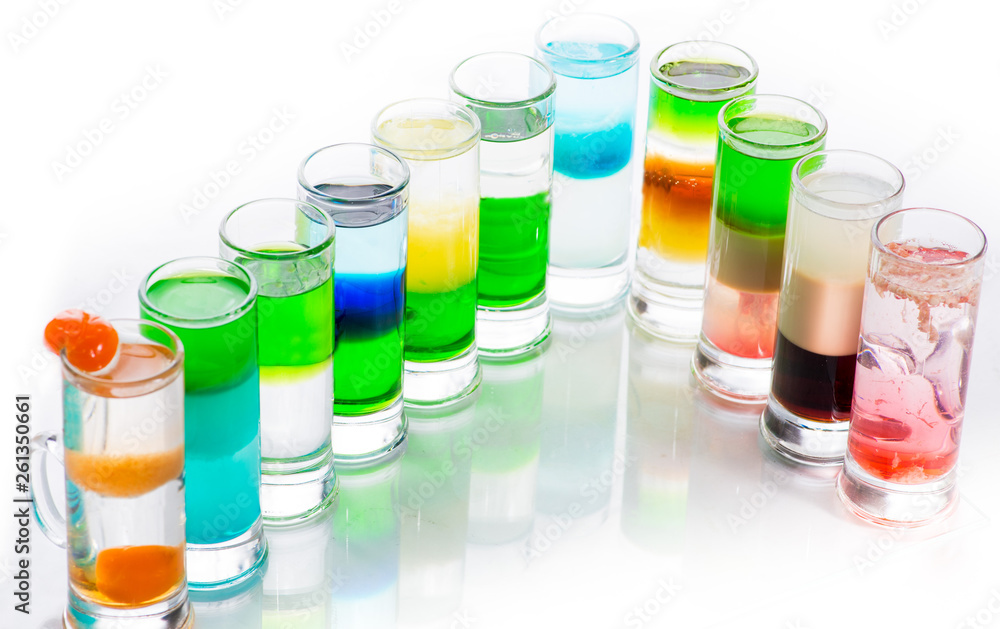 shots of colored layers of different alcohol shots of colored layers of different alcohol