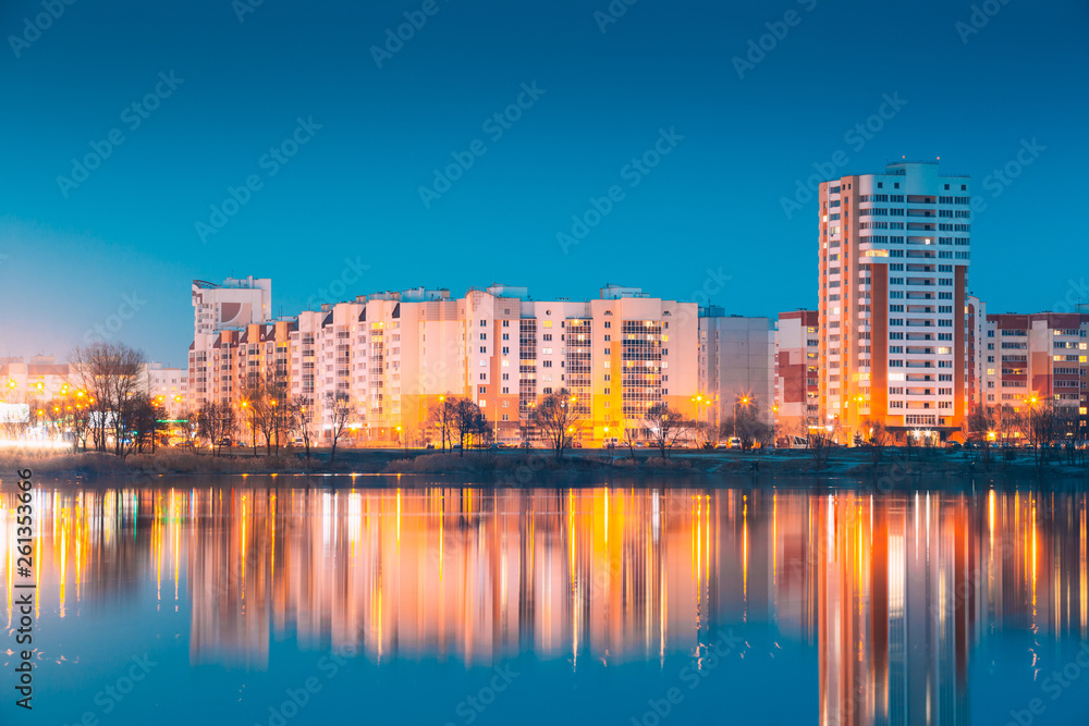 Urban Residential Area Overlooks To City Lake Or River And Park In Evening Illumination, Reflecting In Water Surface. Spring In Gomel Belarus. City Residential Architecture