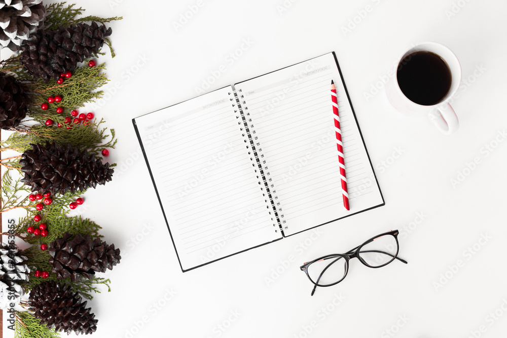notebook open christmas tree and gifts on white background notebook open christmas tree and gifts on white background