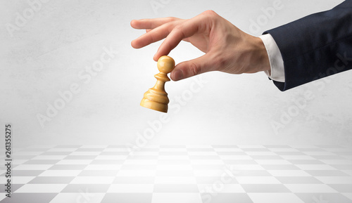 Valokuva Big elegant hand taking his next step on chess game