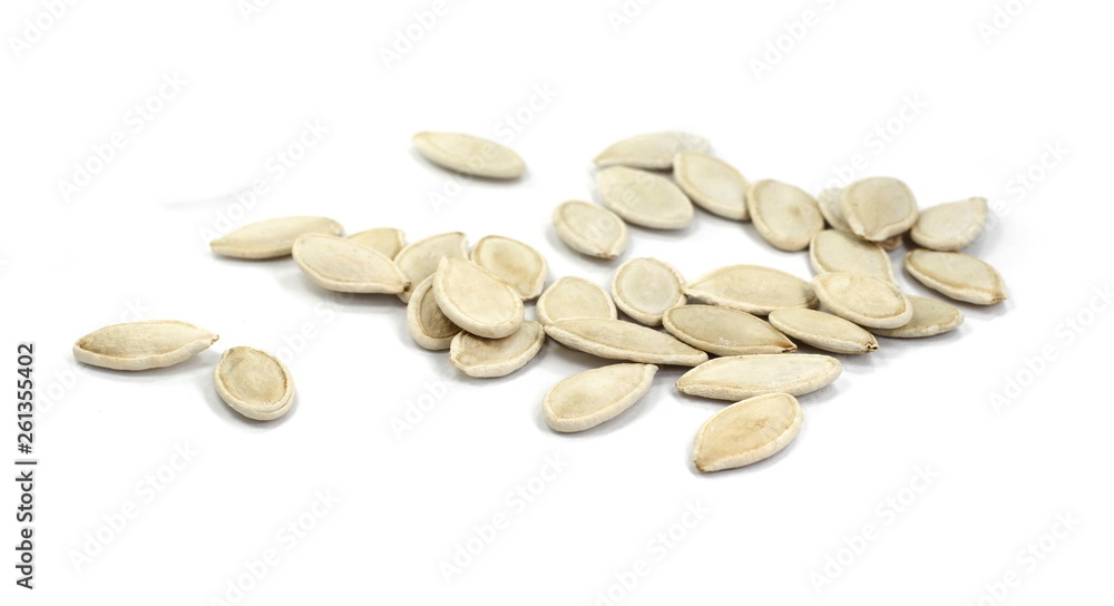 Heap of pumpkin seeds isolated on white background Heap of pumpkin seeds isolated on white background