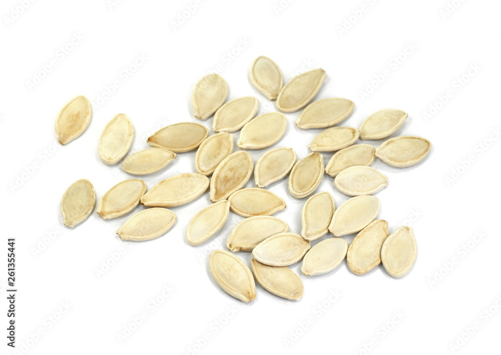 Heap of pumpkin seeds isolated on white background Heap of pumpkin seeds isolated on white background