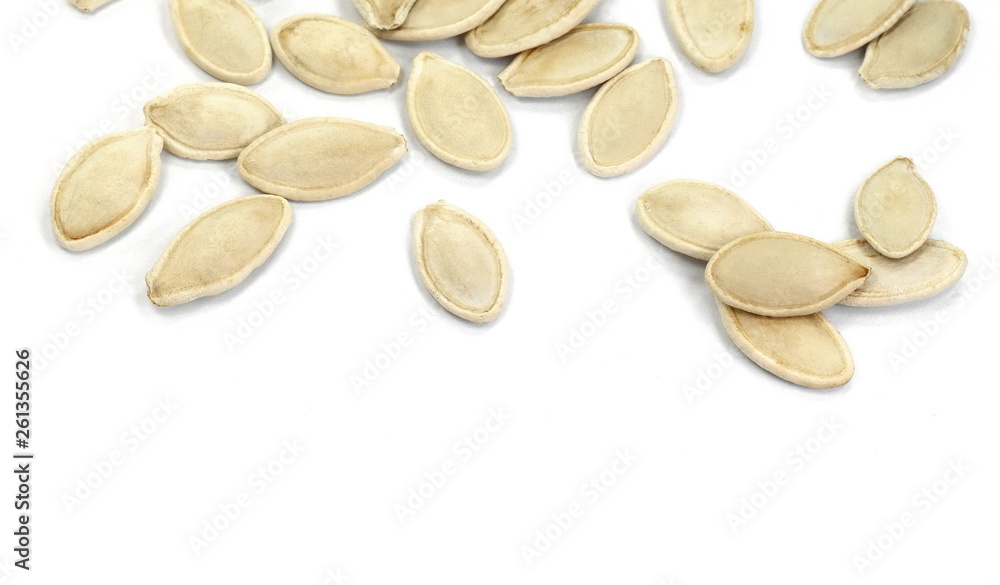 Heap of pumpkin seeds isolated on white background Heap of pumpkin seeds isolated on white background
