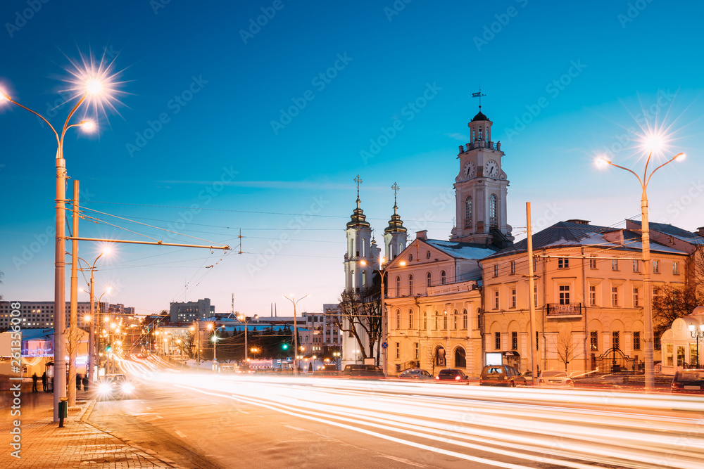 Fototapeta Vitebsk, Belarus. Traffic At Lenina Street, Holy Resurrection Church And City Hall In Evening Or Night Illumination At Winter